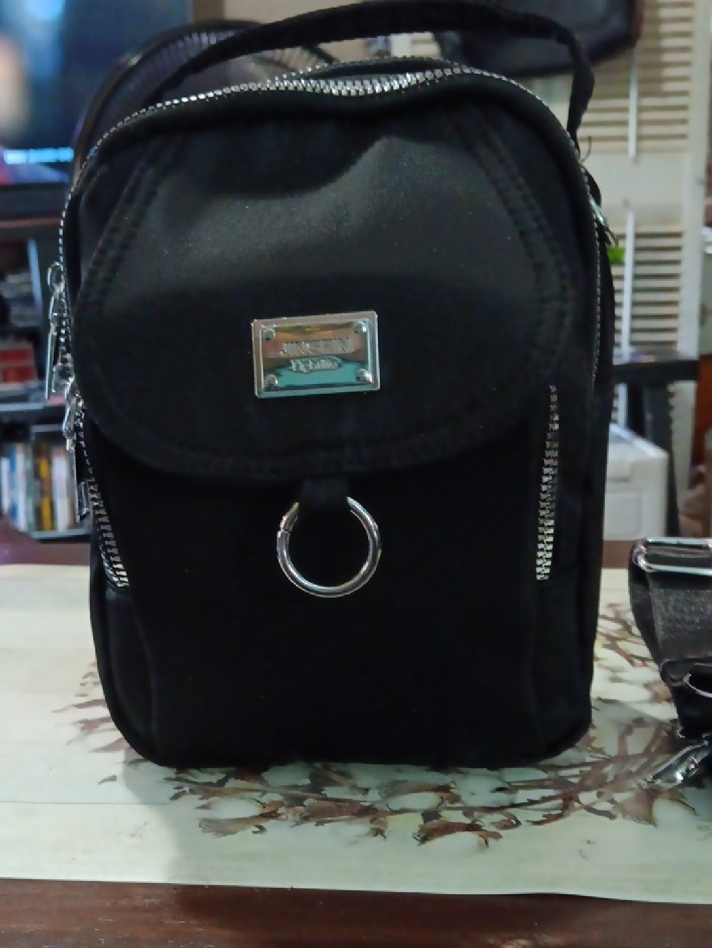 Compact Black Women's Belt Bag with Silver Ring Accent